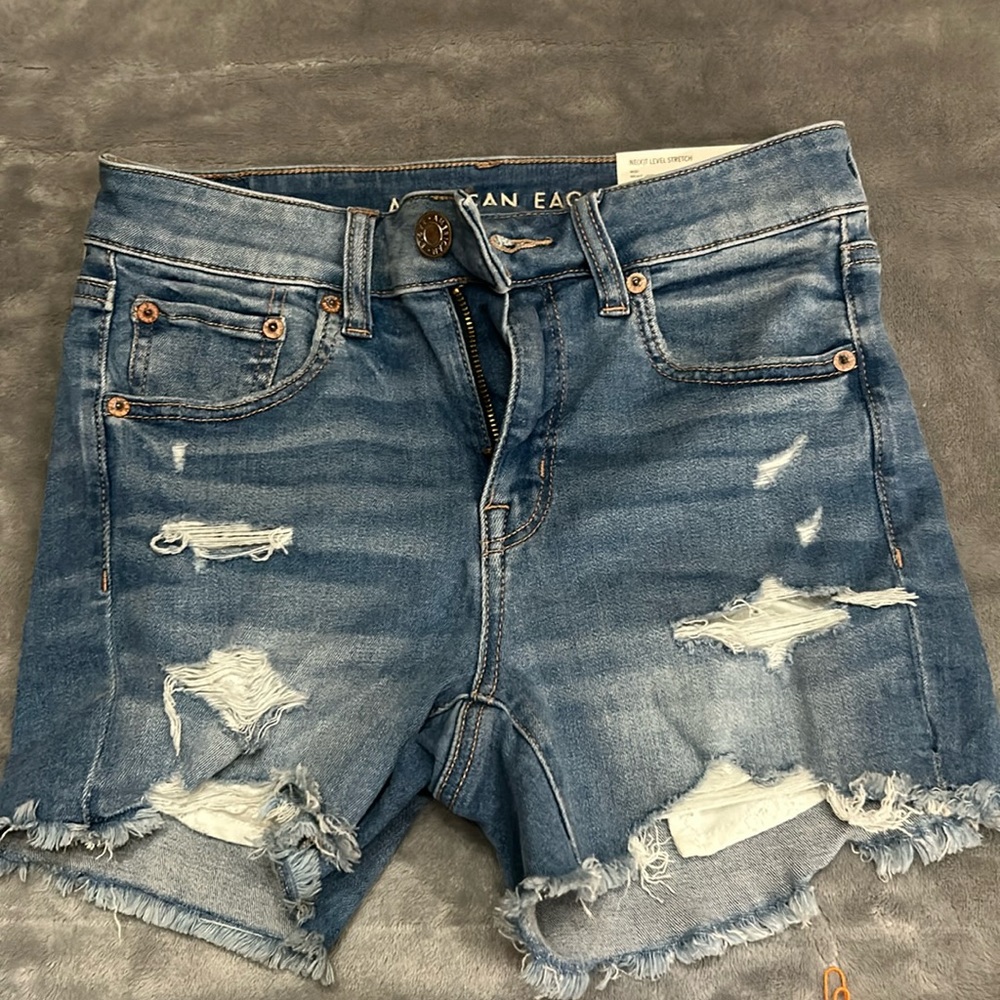 American Eagle ne(x)t level stretch midi blue jean short size 4- 27w-